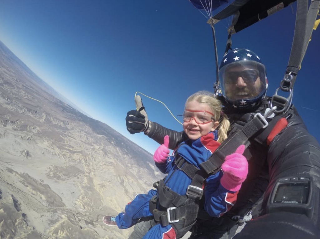 under 18 skydiver under parachute in delta, colorado